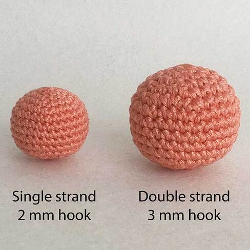 Picture of 2 crochet balls made with one or two strands of same yarn